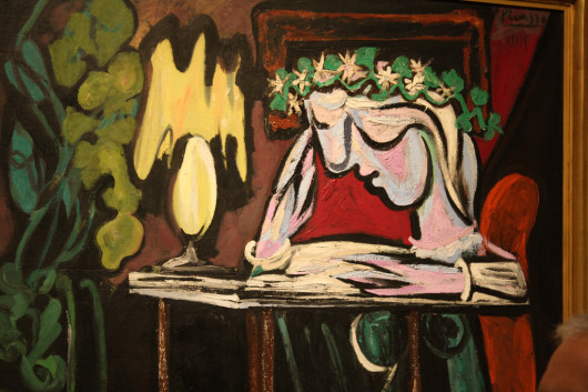Girl Reading at a Table. Pablo Picasso, 1934